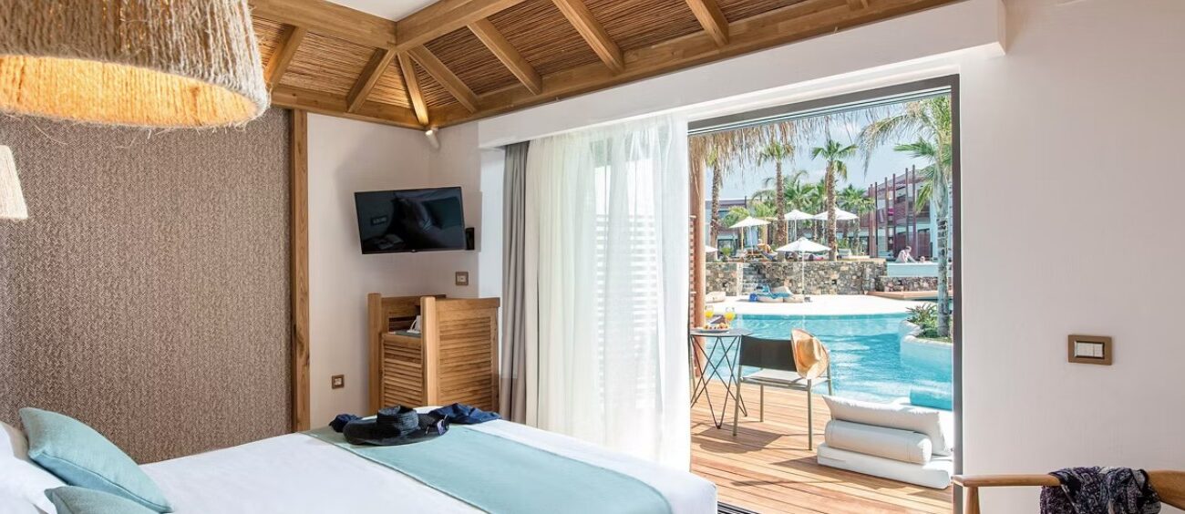 Swim Up Room at Stella Island Luxury Resort & Spa - Image 4